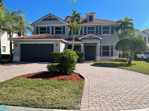 9326 Plantation Estates Dr, West Palm Beach FL  33411-4557 exterior