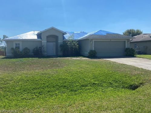 147 Ocean Park Dr, Lehigh Acres, FL 33972-1007